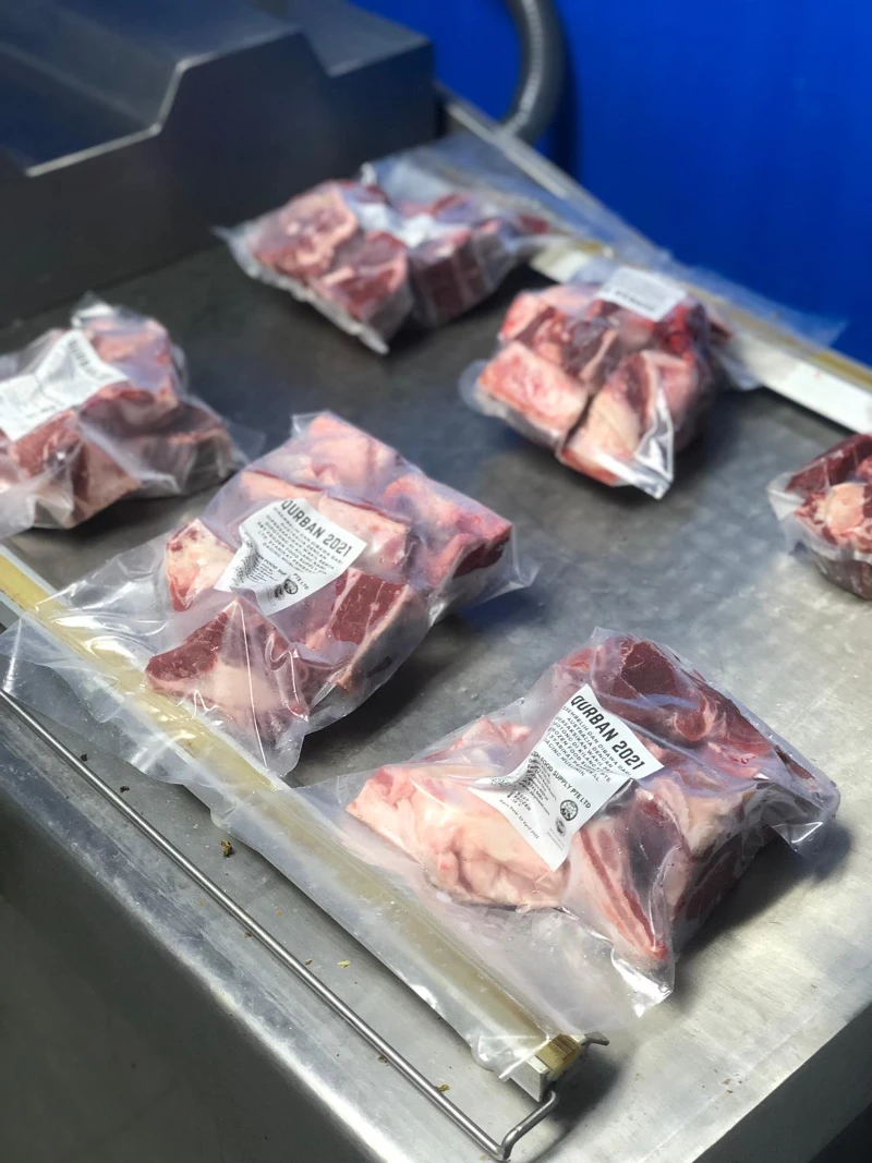 Vacuum-sealed Qurban meat on processing line